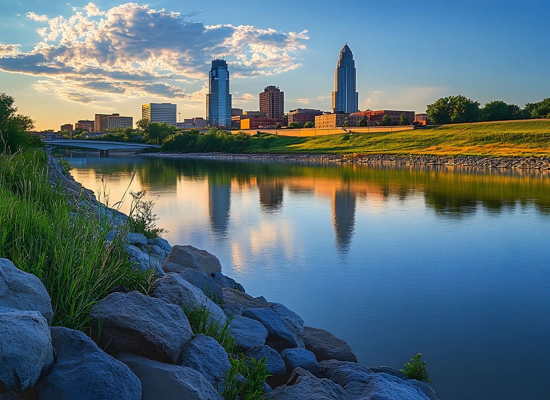 Omaha, NE - Cityscape With Beautiful Water and Rocks During Sunrise